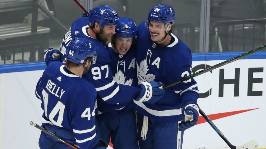 Toronto, ON- January 9  -  Morgan Rielly, Joe Thornton, and Mitch Marner celebrate after a goal by Auston Matthews  in third period action    (Steve Russell/Toronto Star via Getty Images)